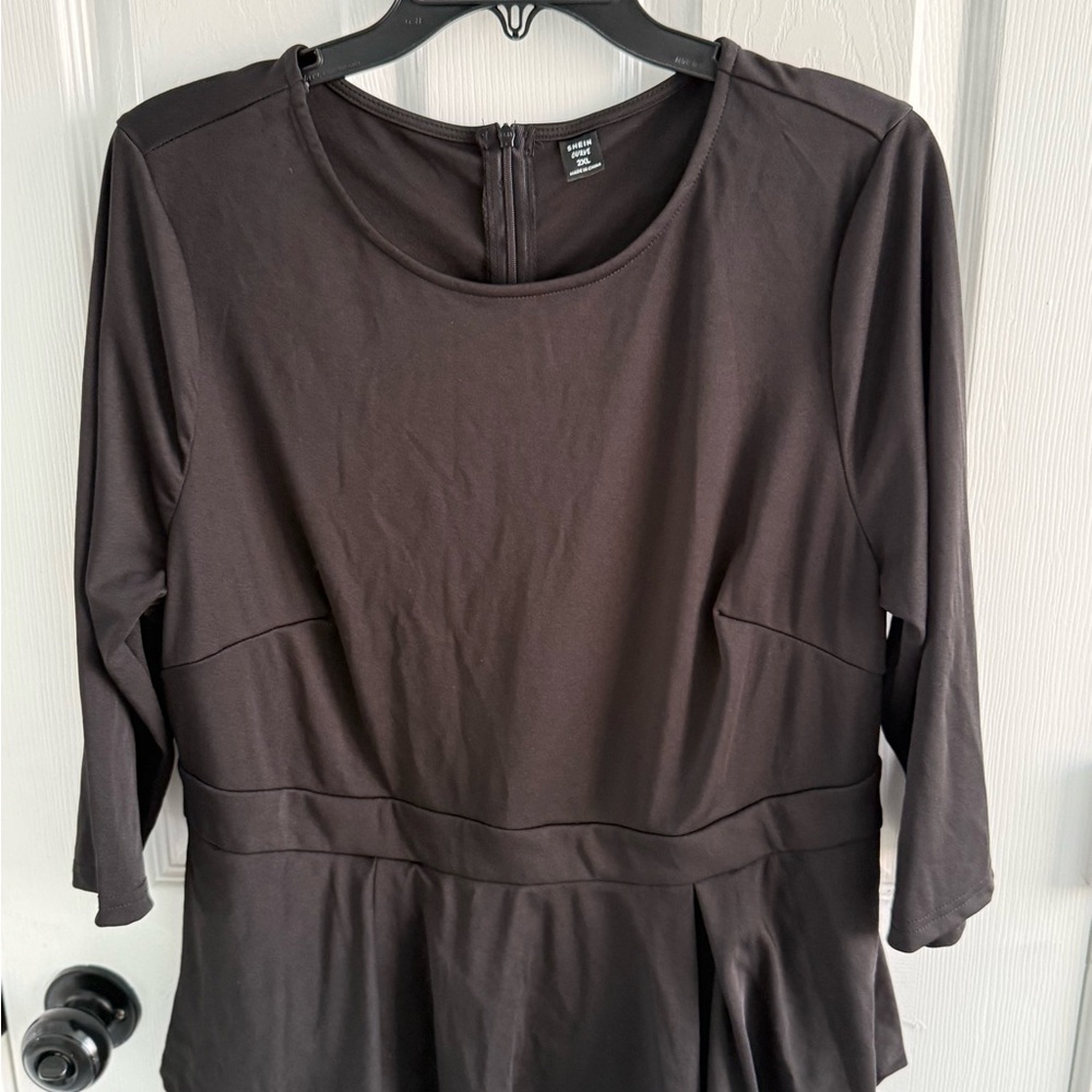 Elegant Black Peplum Dress - Picture 2 of 5